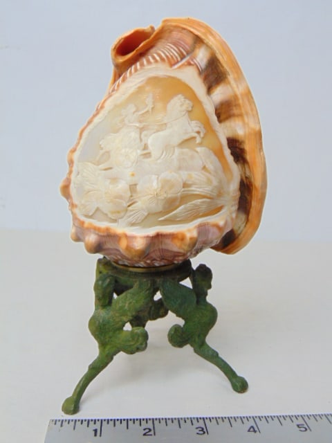 Cameo carved shell on bronze base, shell has scene with chariot , one leg on base is broken, needs (1 of 5)