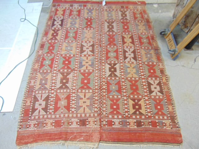 Kilim, possible Turkish, in reds, center seam needs to be resewn, carpet is 88" by 62": Kilim, possible Turkish, in reds, center seam needs to be resewn, carpet is 88" by 62"
