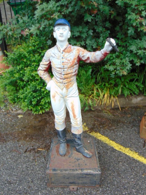 19th Century cast iron figural lawn jockey,hitching post, white pants, red coat & cap, height is (1 of 5)