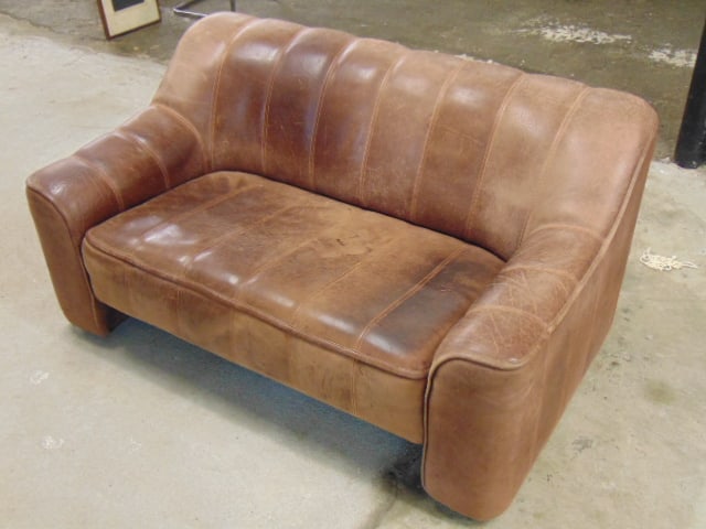 Leather loveseat, excellent quality, no tears, loveseat is 54" long, 32" deep, height is 27", seat: Leather loveseat, excellent quality, no tears, loveseat is 54" long, 32" deep, height is 27", seat height is 16"