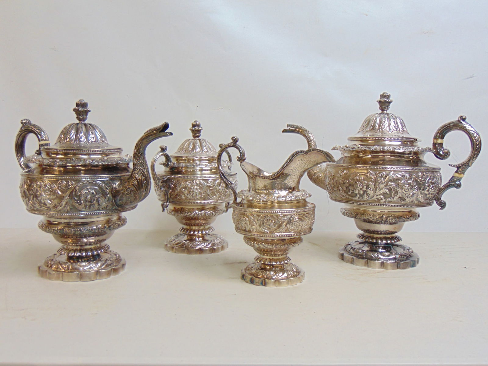 Marquand & Co sterling silver tea set, 147 troy, extensively decorated with floral patterns, (1 of 13)