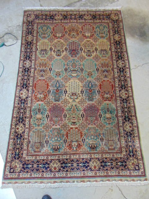 Carpet, extensively decorated with various urned flowers & floral decoration, rug is 86" by 54.5": Carpet, extensively decorated with various urned flowers & floral decoration, rug is 86" by 54.5"
