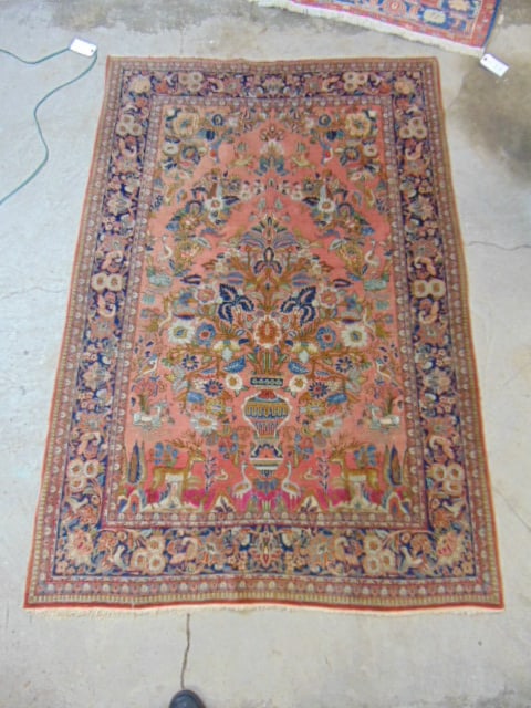 Fine quality carpet (Sarouk ) with floral urn in center and various animals, 80" by 54.5" (1 of 6)