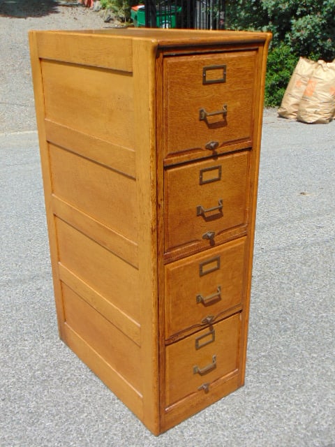 Oak 4 drawer file cabinet, raised panel sides, cabinet is 17.25" by 29.5" deep, height is 51" (1 of 4)