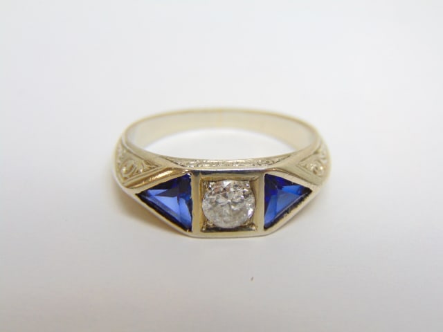 Jewelry. Platinum Art Deco Diamond ring with blue stones. hallmark on outer shank, diamond is (1 of 5)