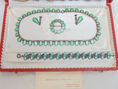 Danish jewelry suite, designed by Volmer Bahner in custom box, sterling silver and green guilloche: Danish jewelry suite, designed by Volmer Bahner in custom box, sterling silver and green guilloche enamel necklace; bracelet; pin; & earrings. one panel has a small blemish, wear, see additional image