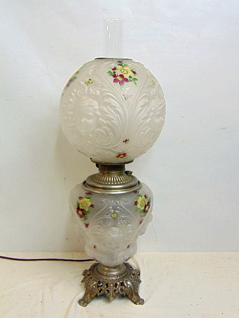 Gone with the Wind lamp, clear glass base & top shade with floral decorations & face reliefs, height: Gone with the Wind lamp, clear glass base & top shade with floral decorations & face reliefs, height is 27"