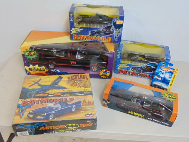 Batman toy lot, 4 batmobiles & one batplane, all in original boxes, includes two "Johnny Lightning" (1 of 7)