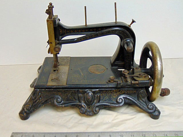 Early sewing machine, no make, appears French made, paint decorated, base is 14" by 9.5", height is (1 of 7)