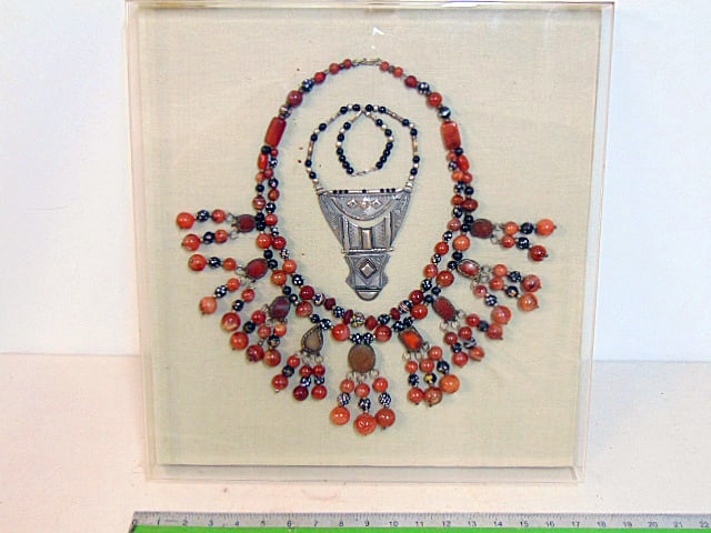 Framed ethnic necklaces, stone & silver (?), in Lucite shadow box frame, amber colored stones. (1 of 7)
