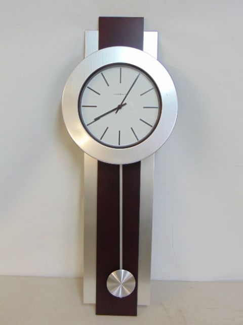Howard Miller wall clock, in brushed aluminum & burgundy red, clock is 35.25" tall, model 625-279,: Howard Miller wall clock, in brushed aluminum & burgundy red, clock is 35.25" tall, model 625-279, plastic
