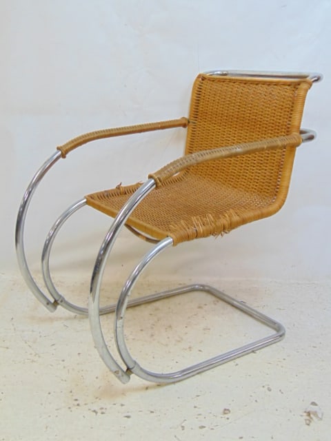 Mid Century Mies van der Rohe for Stendig Danish made armchair, chrome tubular steel frame with: Mid Century Mies van der Rohe for Stendig Danish made armchair, chrome tubular steel frame with rattan woven seat & back, rattan is torn at frame..