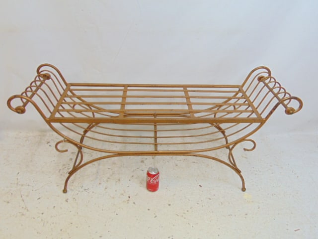 Gilt metal bench with scrolled arms, slatted metal seat, length is 4 feet.: Gilt metal bench with scrolled arms, slatted metal seat, length is 4 feet.