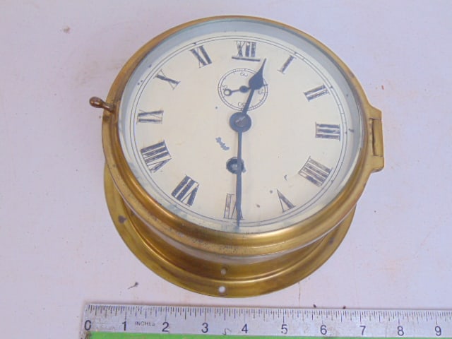 Brass nautical clock, no make, beveled glass, diameter is 6.5", some paint loss on dial (1 of 5)