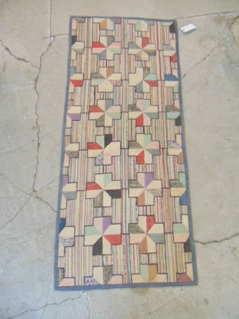 Hooked scatter rug with geometric pattern, rug is 71" by 31" (1 of 4)