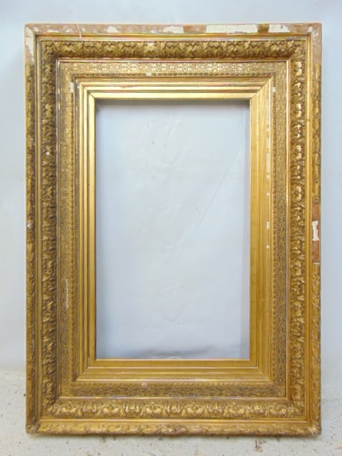 Large gilt frame, plaster applied decorations, as is condition, lots of trim missing, chipped, frame: Large gilt frame, plaster applied decorations, as is condition, lots of trim missing, chipped, frame opening 18.5" by 30.5"