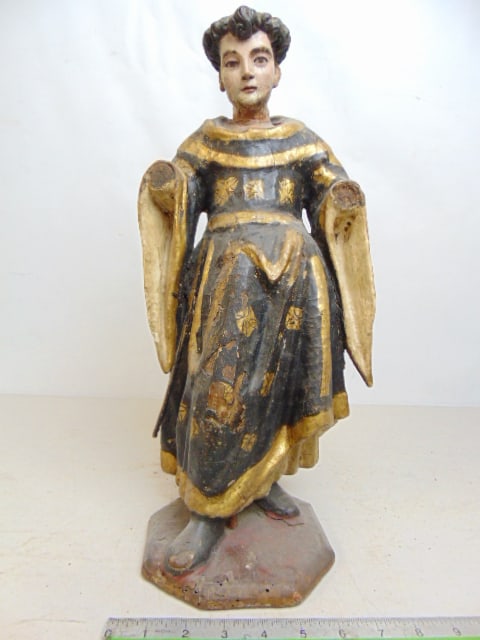 Carved wood polychrome Santos figure in a black & gilt accented robe, late 18th, early 19th Century, (1 of 5)