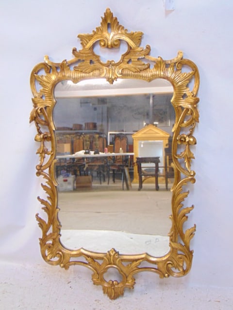 Ornate gilt framed mirror with carved frame, mirror is 52.5" tall, 30.25" wide. (1 of 4)