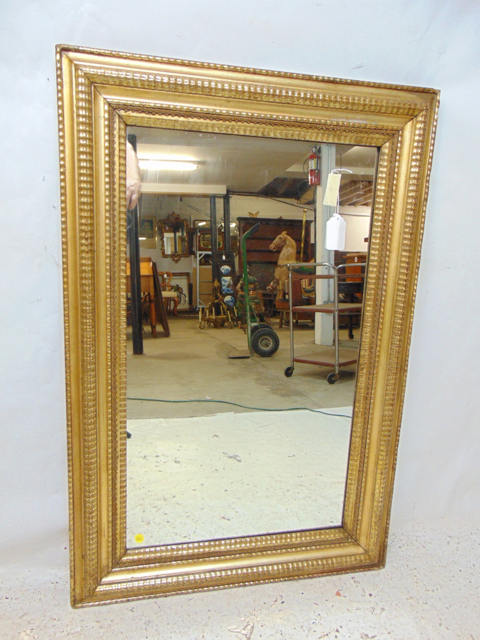 Gilt framed mirror, new glass, mirror is 42" by 28": Gilt framed mirror, new glass, mirror is 42" by 28"