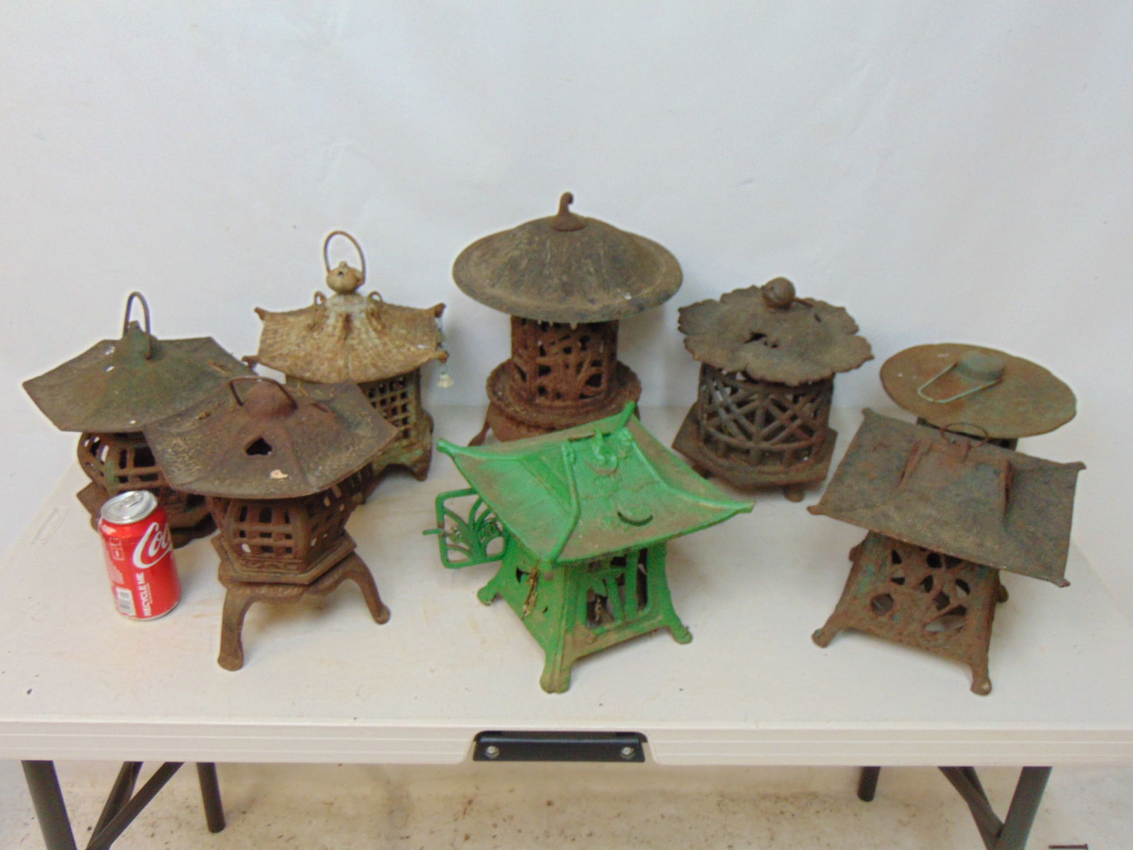 8 Japanese cast iron garden lanterns, various designs, some painted. (1 of 5)