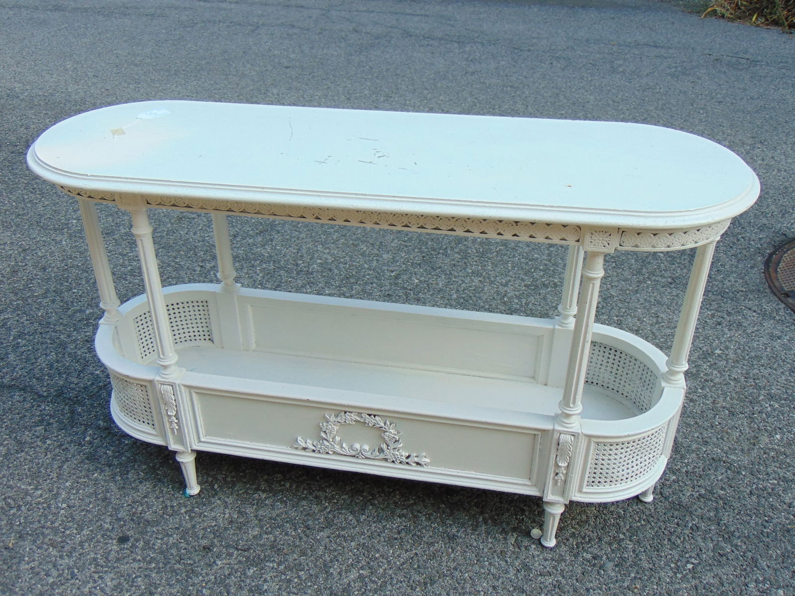 White painted table with lower planter shelf, curved caned sides, table is 55" long, 18" deep, heigh (1 of 5)
