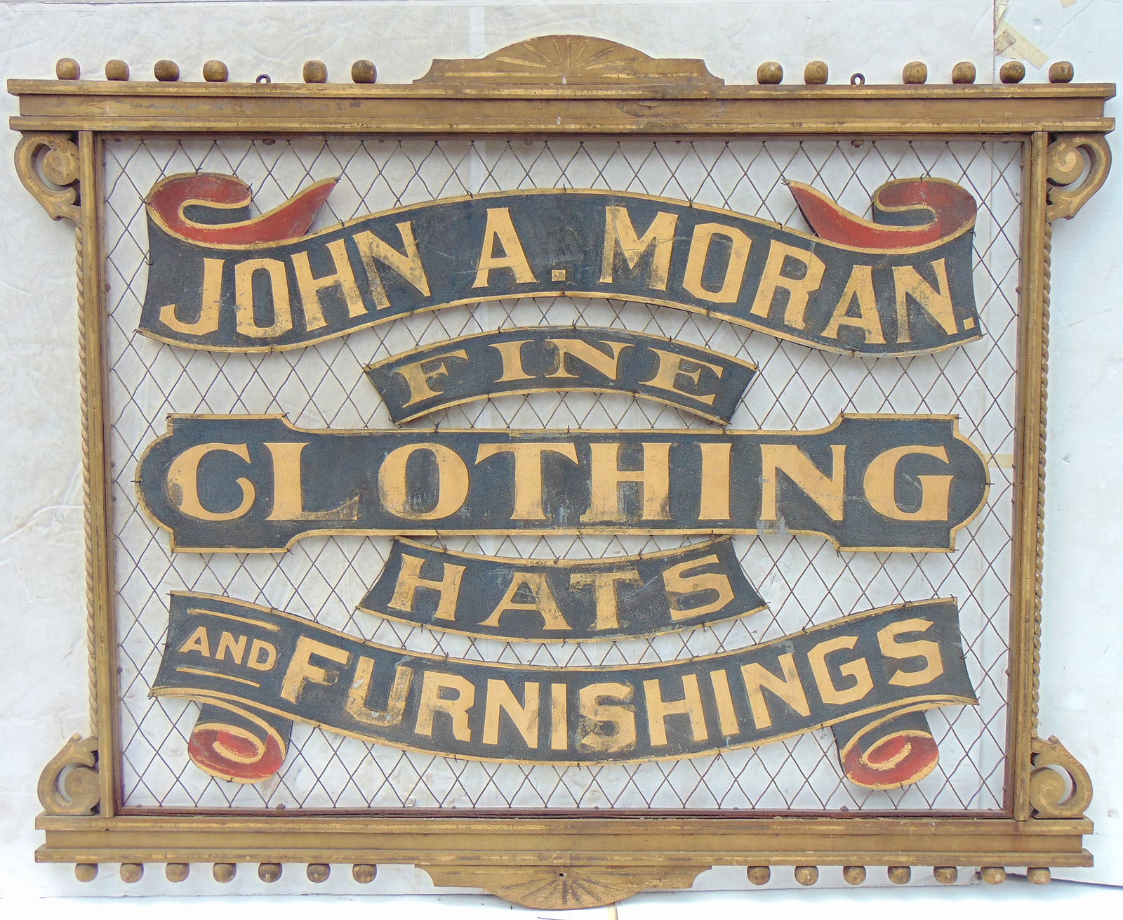 Trade sign, Clothing, "JOHN A. MORAN FINE CLOTHING HATS AND FURNISHINGS", wire body with carved & (1 of 14)