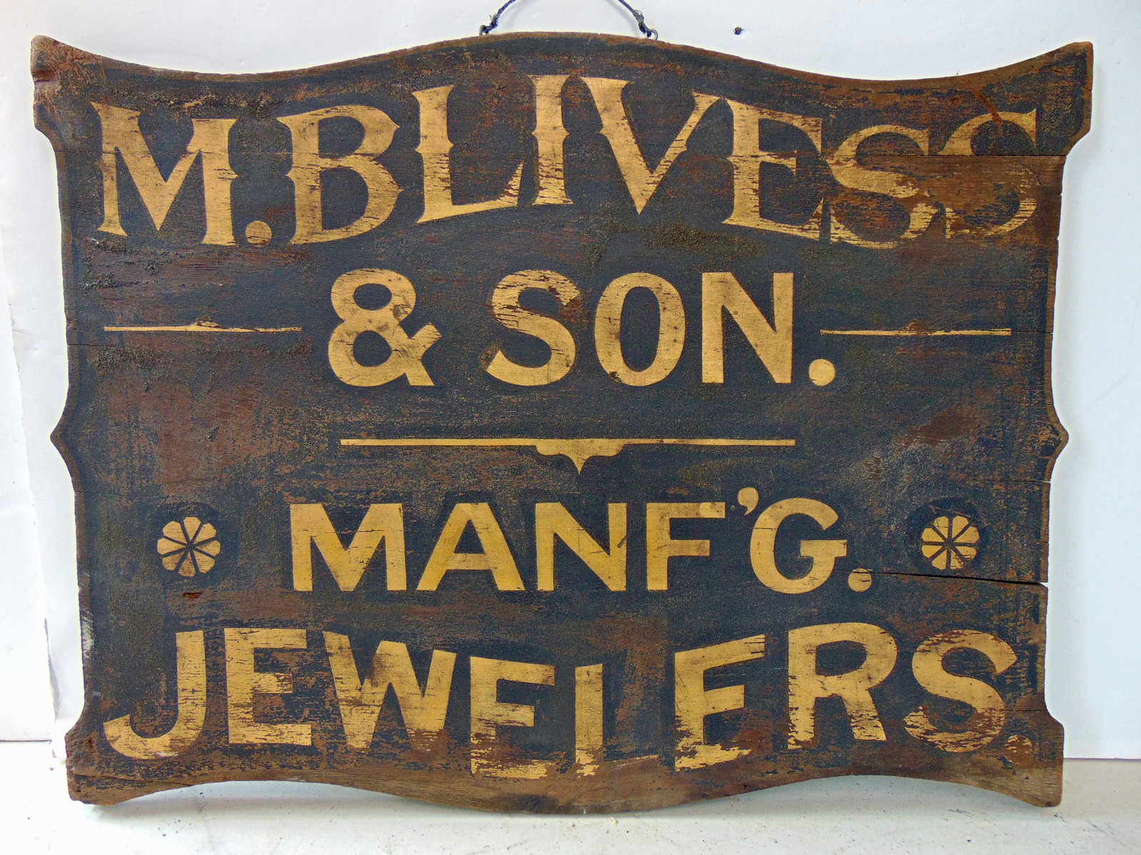 Trade sign, double sided, "M.BLIVESS & SON. MANF'G. JEWELERS", gilting on painted wood, 18 1/2" x: Trade sign, double sided, "M.BLIVESS & SON. MANF'G. JEWELERS", gilting on painted wood, 18 1/2" x 24"