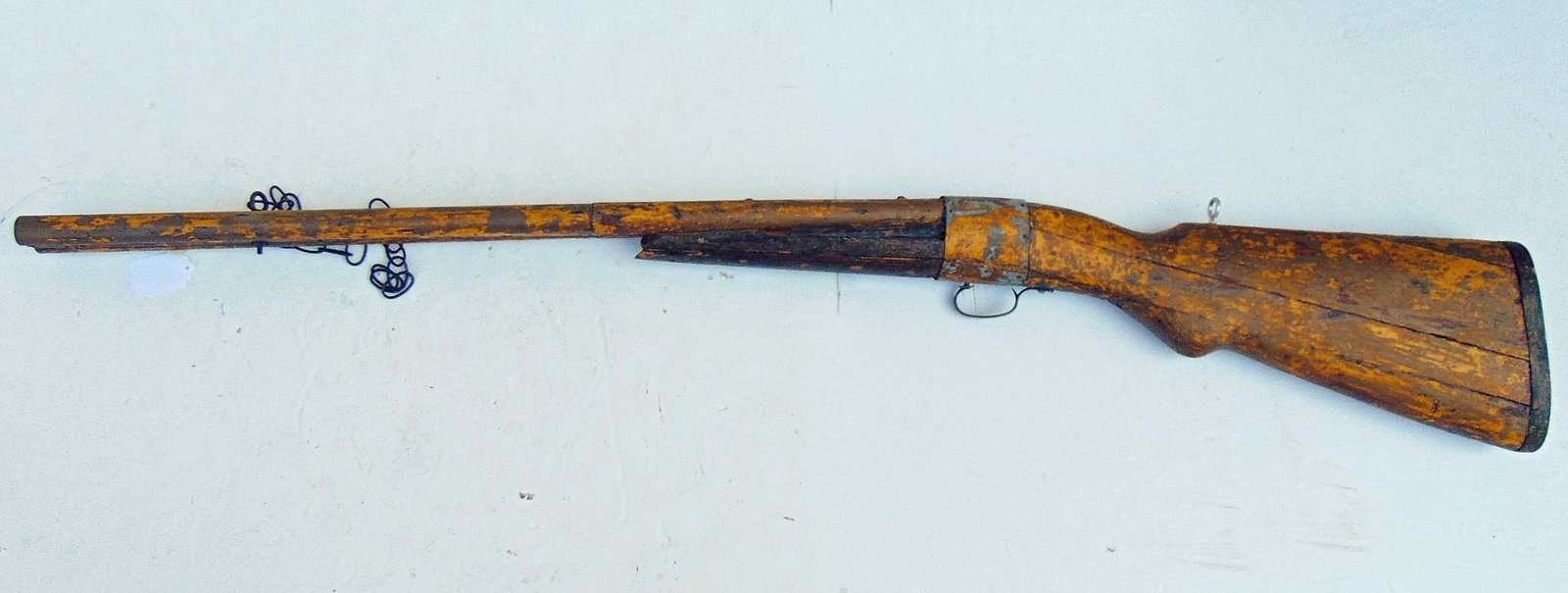 Trade sign gunsmith the third, carved wood shotgun with metal mounts, traces of yellow paint 63": Trade sign gunsmith the third, carved wood shotgun with metal mounts, traces of yellow paint 63"