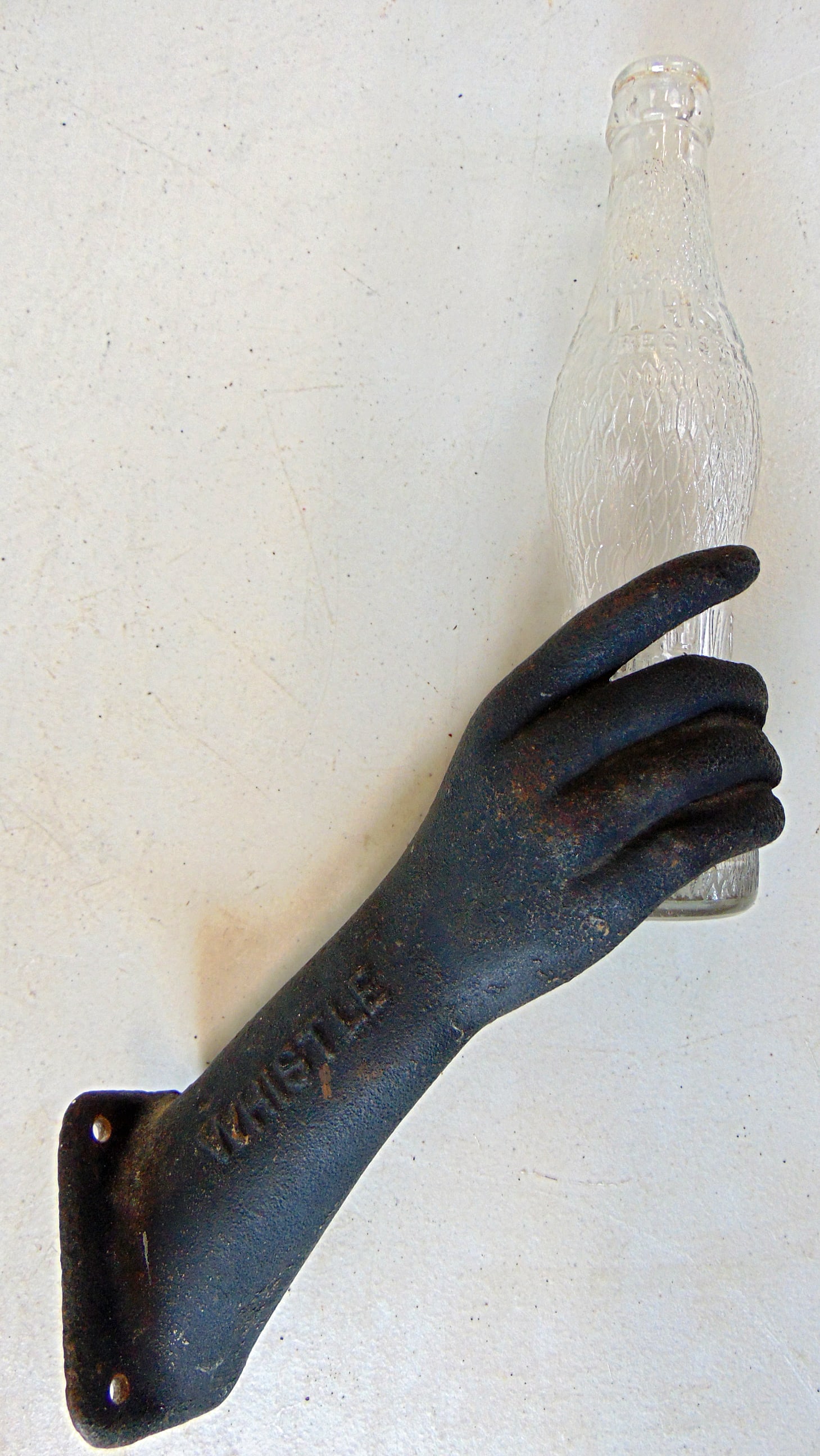Cast iron advertising sign, WHISTLE beverage three dimensional hand w/ glass bottle, 15" length (1 of 7)