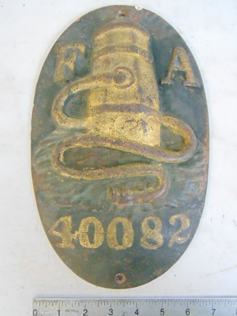 Cast iron firemarker, "F.A." & barrel with hose, #40082, 11 7/8" by 7 1/8" (1 of 4)