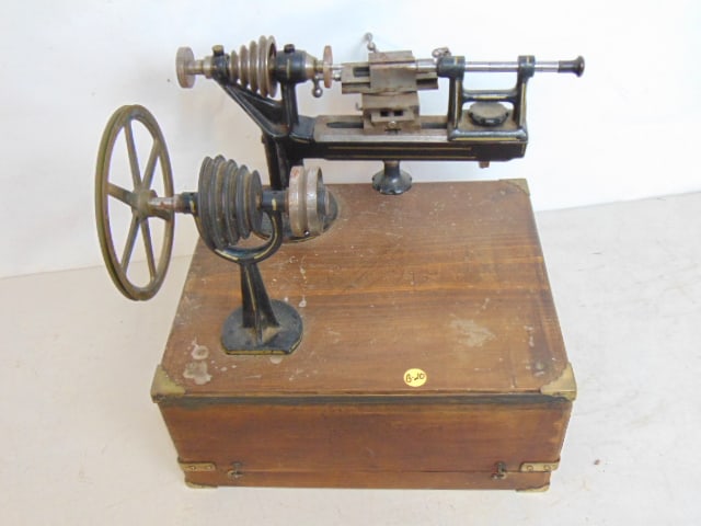 Small sized lathe on wood base with storage, marked Greenfield Massachusetts, wood base is 14.25" by (1 of 7)