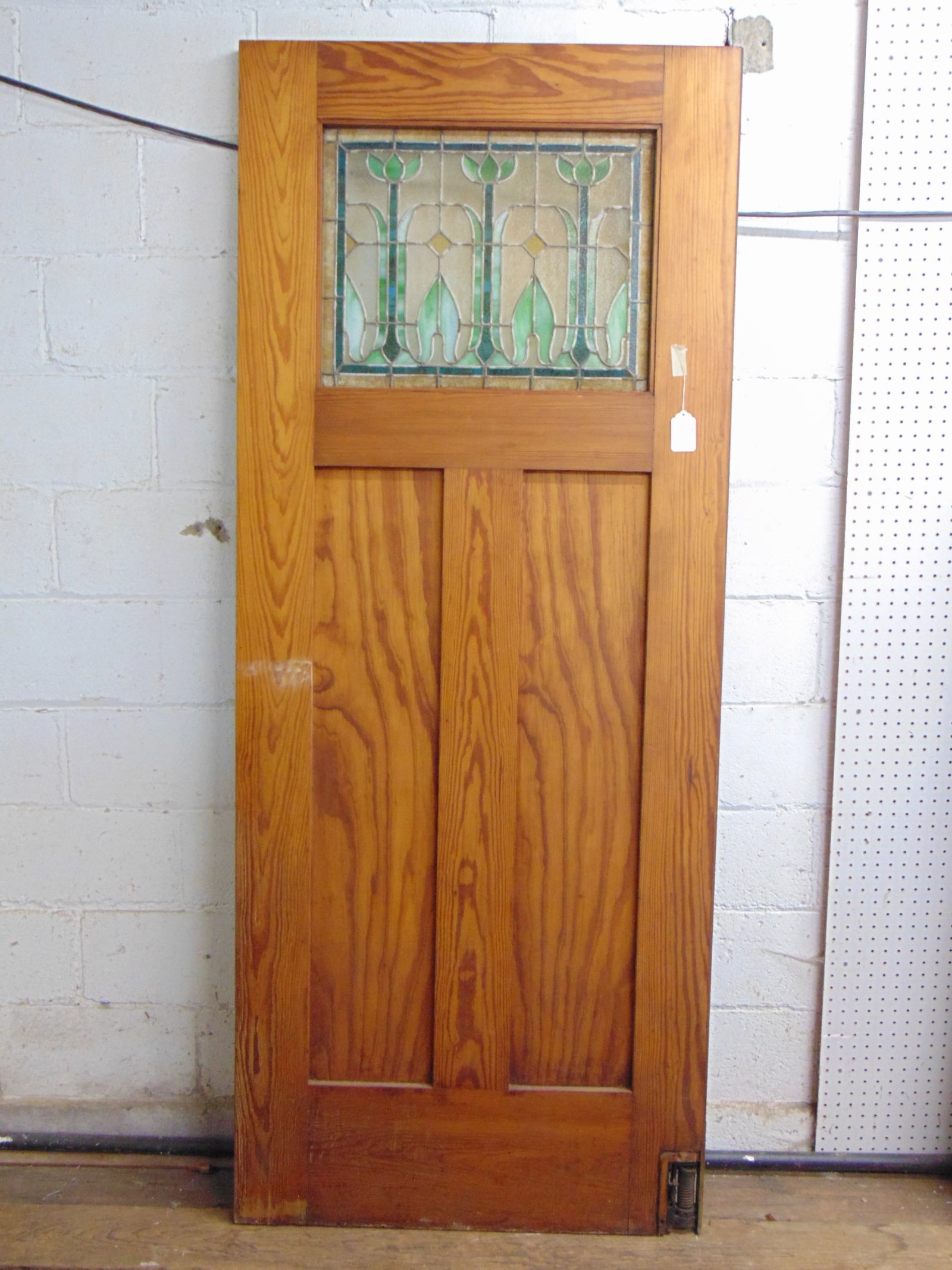 Arts & crafts raised panel door with leaded window, floral decorated in arts & crafts style, door is: Arts & crafts raised panel door with leaded window, floral decorated in arts & crafts style, door is 82.75" tall, 33.75" wide, window is 17.25" by 22.5"