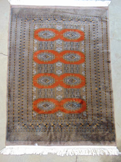 Bokhara scatter rug, wool & silk, brown with orange brown center, carpet is 66" by 48" (1 of 4)