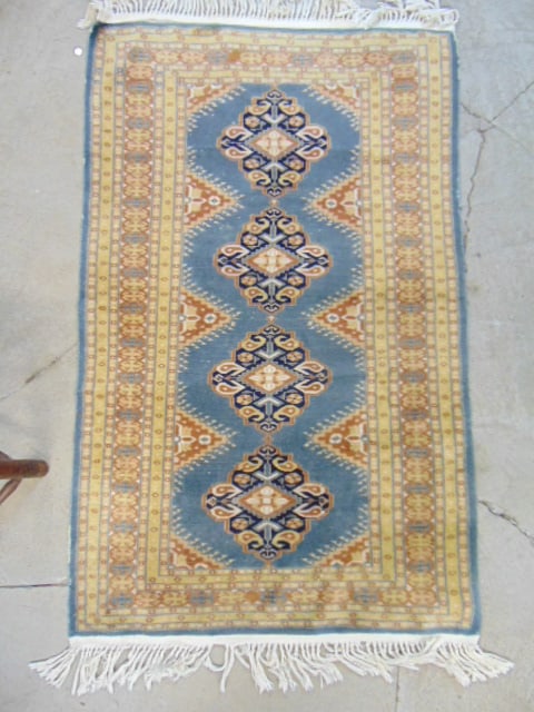 Scatter rug in blue beige, some wear on edges, pile has wear, carpet is 57" x 36" (1 of 5)