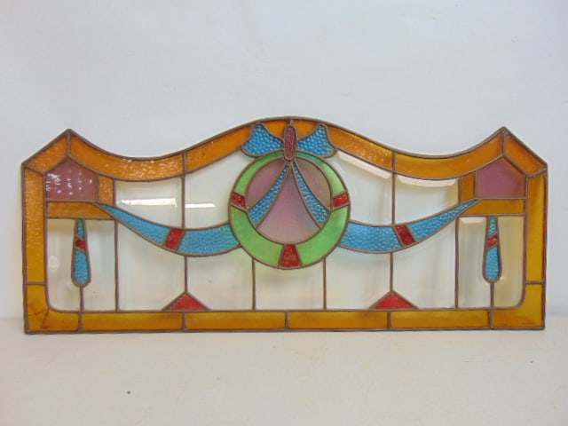 Leaded glass window with decorative ribbon design, curved top, 13" tall, 32" wide, left corner amber: Leaded glass window with decorative ribbon design, curved top, 13" tall, 32" wide, left corner amber panel is cracked