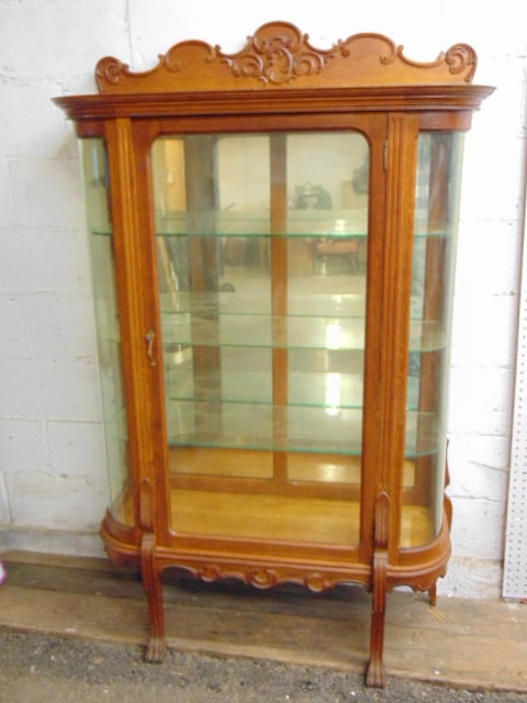 Oak China cabinet with curved sides & glass shelves, cabinet is 41" wide, 16" deep, height is 64": Oak China cabinet with curved sides & glass shelves, cabinet is 41" wide, 16" deep, height is 64"