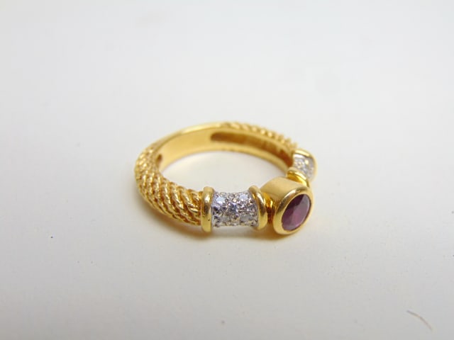 JEWELRY. 18kt yellow gold ring bezel set red gem stone & diamond chips, 6.57 grams (1 of 4)