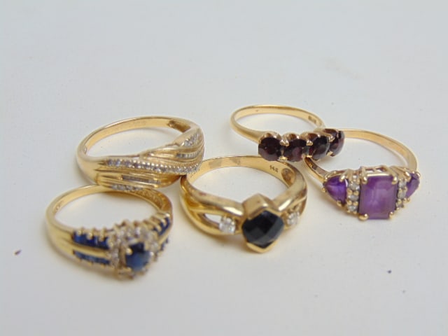 JEWELRY. Grouping of (5) gold rings. 14kt rings all hallmarked, assorted gemstones. total weight 16 (1 of 7)
