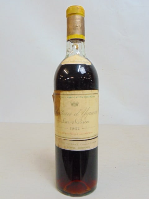 Vintage bottle of Chateau d'Yquem Lus Saluces wine, vintage 1962, unopened.: Vintage bottle of Chateau d'Yquem Lus Saluces wine, vintage 1962, unopened.