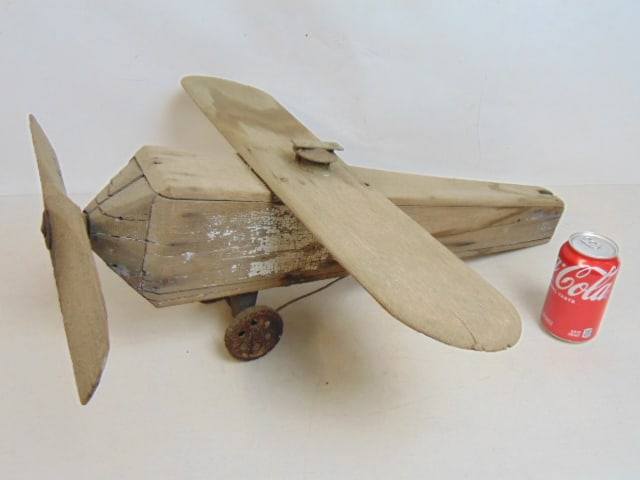 Primitive airplane weathervane or whirligig, tail missing, length is 27", wingspan is 24.5" (1 of 4)