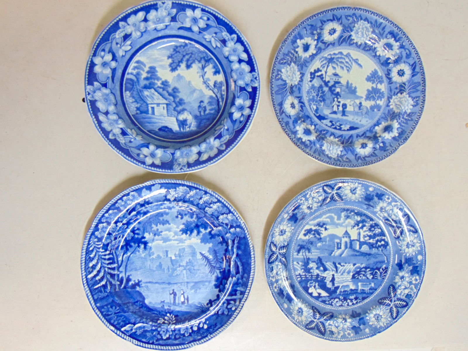 4 Staffordshire plates, one deep soup, 3 dinner plates, 10" includes Zebra plate, various landscapes (1 of 8)