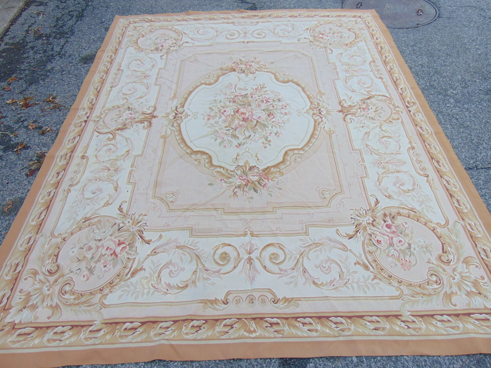 Roomsize needlepoint carpet, floral decorated with center medallion, beige brown tints (1 of 5)