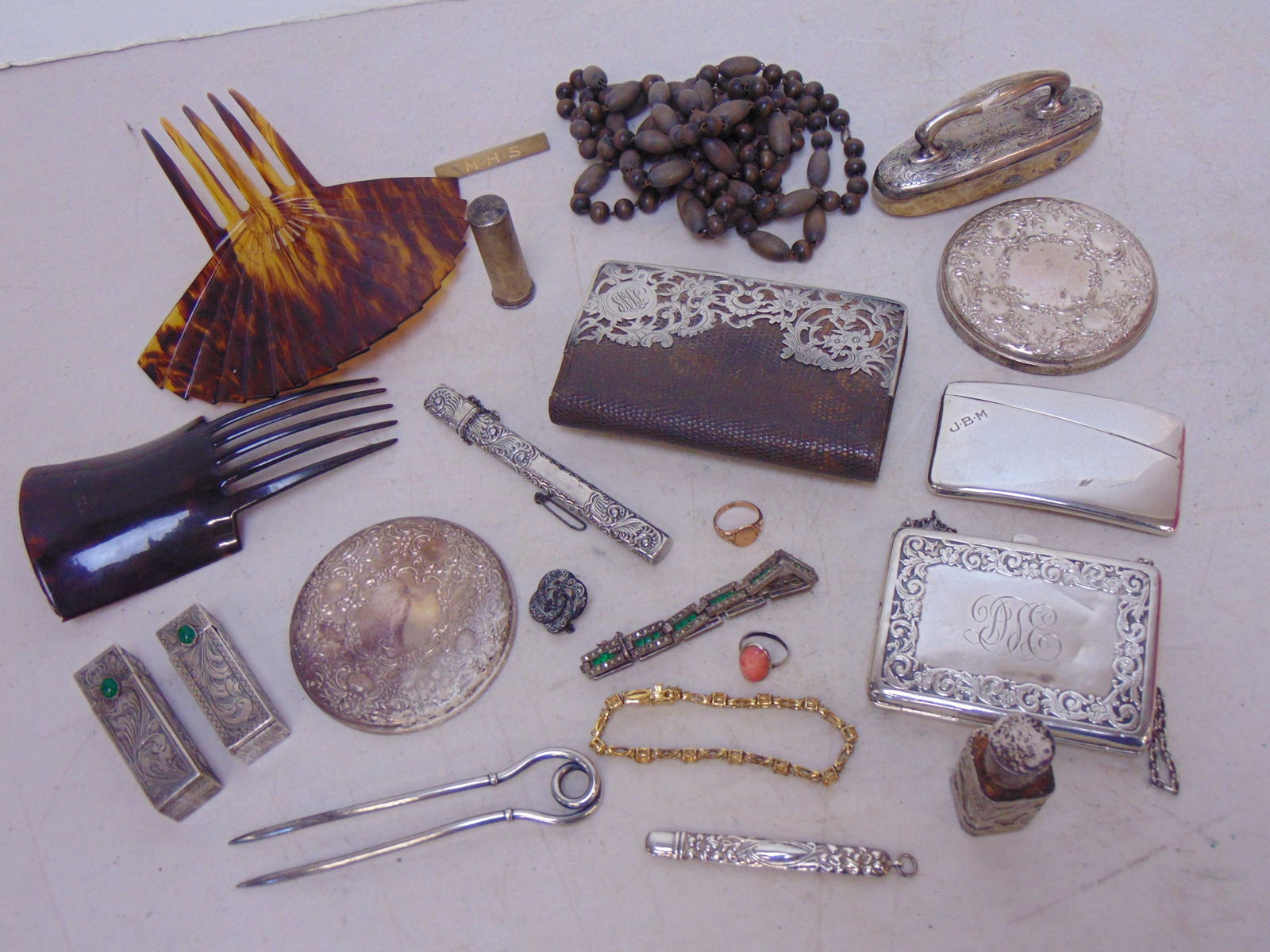 Lot misc. silver items, snake skin & silver wallet, hair combs, jewelry, small 10k ring, silver lips (1 of 7)