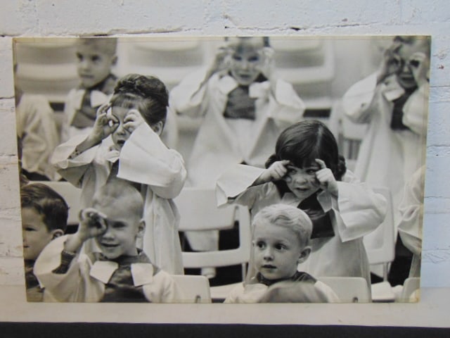 Guy Gillette photograph, children in classroom, 12.75" by 19.25".: Guy Gillette photograph, children in classroom, 12.75" by 19.25".
