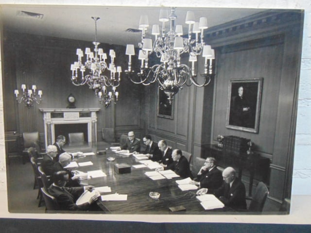 Guy Gillette photograph, men seated around a conference table, Photograph by Guy Gillette,: Guy Gillette photograph, men seated around a conference table, Photograph by Guy Gillette, represented by Virginia Davis, 13.75" by 19.25"