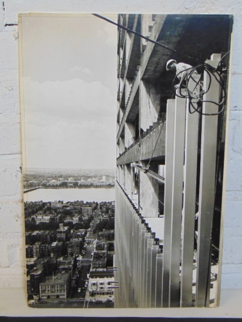 Guy Gillette photograph, steelworker working on skyscraper with MIT in background, Photograph by Guy: Guy Gillette photograph, steelworker working on skyscraper with MIT in background, Photograph by Guy Gillette, represented by Virginia Davis, 19" by 13"