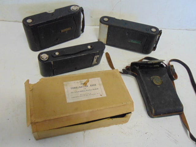 4 vintage folding Kodak cameras, one is stuck (opens but hard to sliden out), also includes plates, (1 of 12)