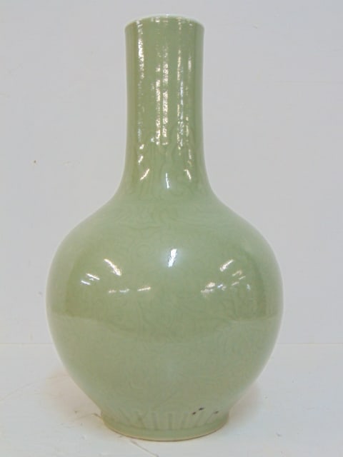 Chinese celadon vase with pattern, light green, height is 15.75", drilled. (1 of 5)