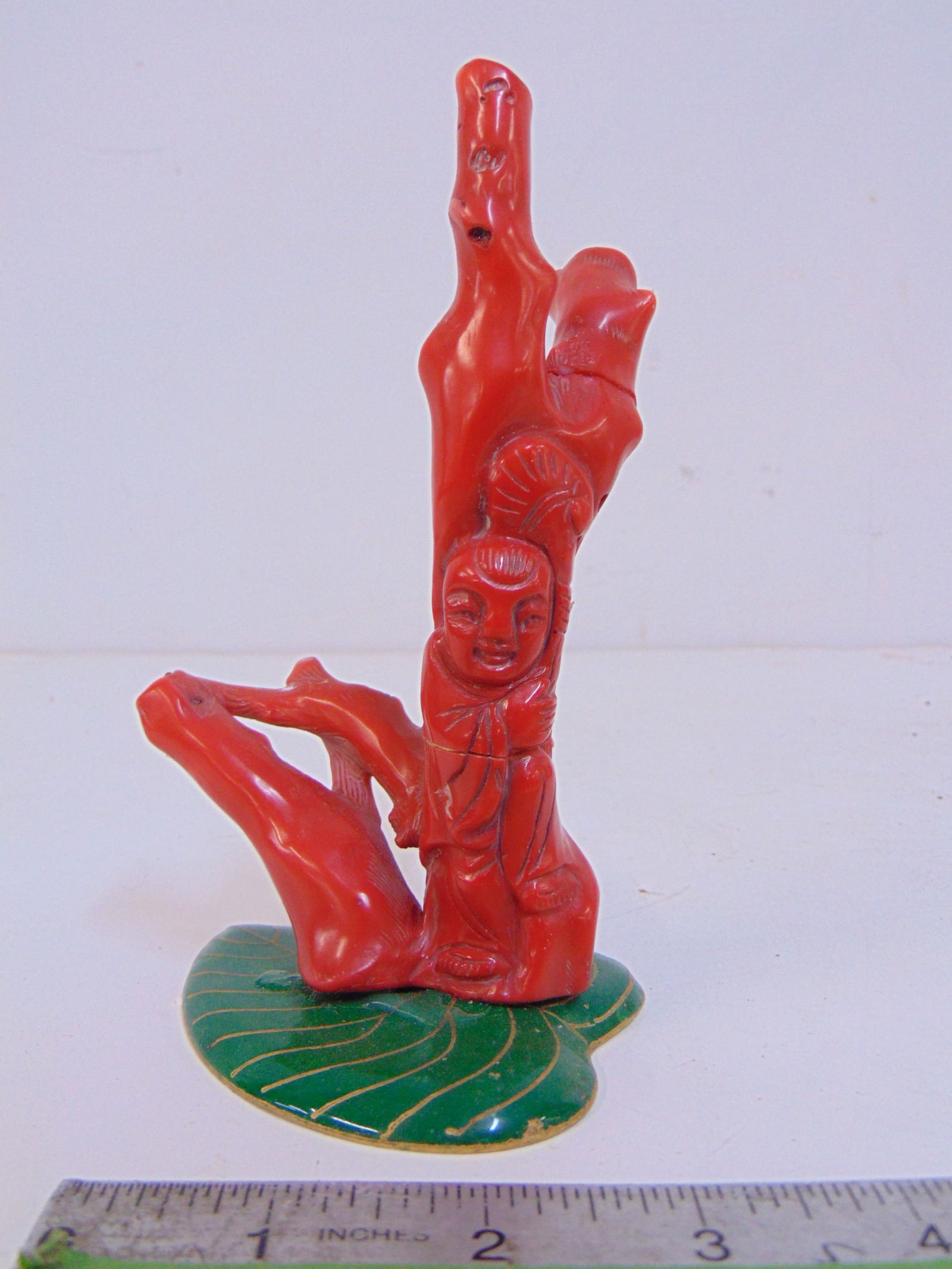 Chinese carving in blood coral, on enamel base, coral is glued in 2 places, height is 6": Chinese carving in blood coral, on enamel base, coral is glued in 2 places, height is 6"