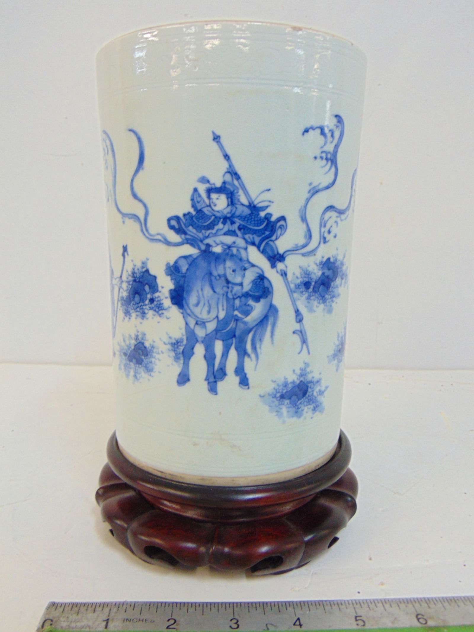 Asian blue & white porcelain brush pot vase, with warrior on horseback scene, on wood base, vase is (1 of 7)
